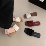 Korean Folded Soft Leather Slippers Women Wear Summer Soft Flat Bottom Beach Beach Shoes Fairy Wind Cool Drag HZ0115