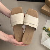 Korean Folded Soft Leather Slippers Women Wear Summer Soft Flat Bottom Beach Beach Shoes Fairy Wind Cool Drag HZ0115